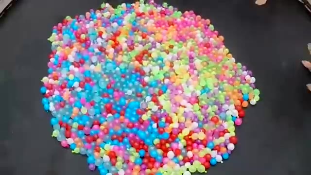 1500 Water Balloons + Trampoline- SLO MO!!